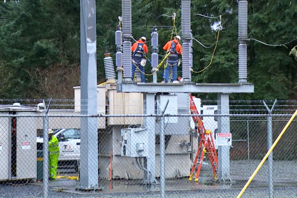 Crews work to restore power to a electricity substation in Pierce County, Washington, on Monday. (KING)