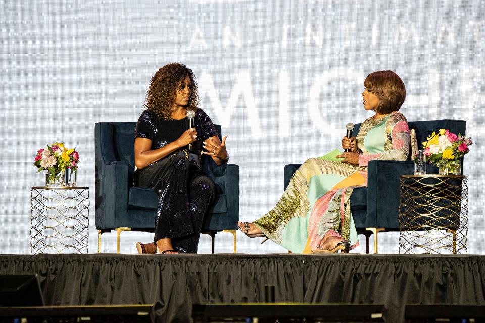 Michelle Obama and Gayle King participate in the 2019 Essence Festival at the Mercedes-Benz Superdome, Saturday, July 6, 2019, in New Orleans. (Photo by Amy Harris/Invision/AP) ORG XMIT: LABB133