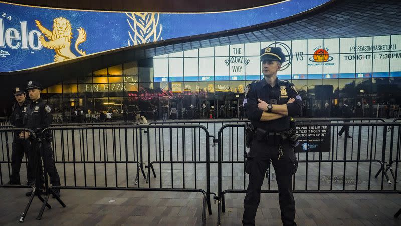 Police officers increase their presence at Barclays arena for a preseason NBA basketball game between the Brooklyn Nets and Israel’s Maccabi Ra’anana, Thursday, Oct. 12, 2023, in New York.