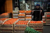 People work at the Mercado Central in Buenos Aires