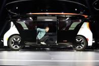Cruise CTO Kyle Vogt stretches inside a Cruise Origin autonomous vehicle during its unveiling in San Francisco