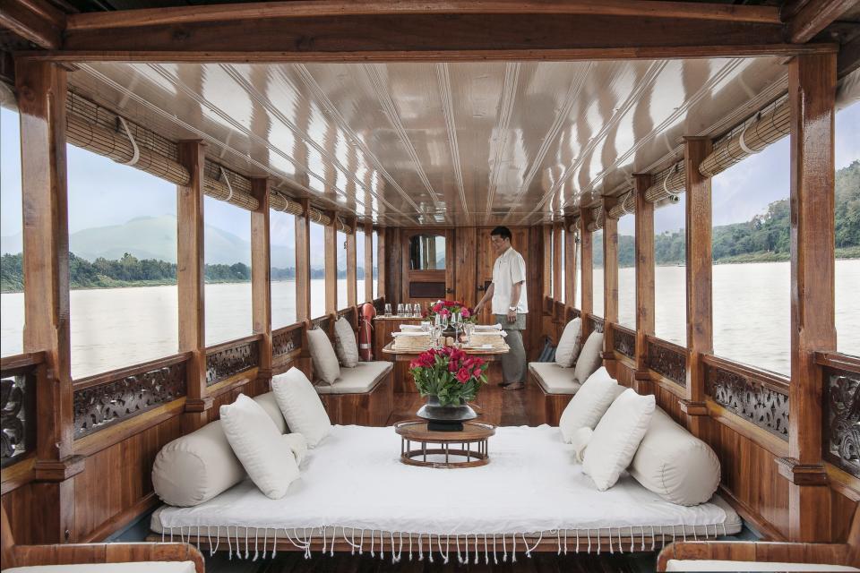 The Amantaka’s wellness cruise down the Mekong River to the Pha Tad Ke Botanical Garden.