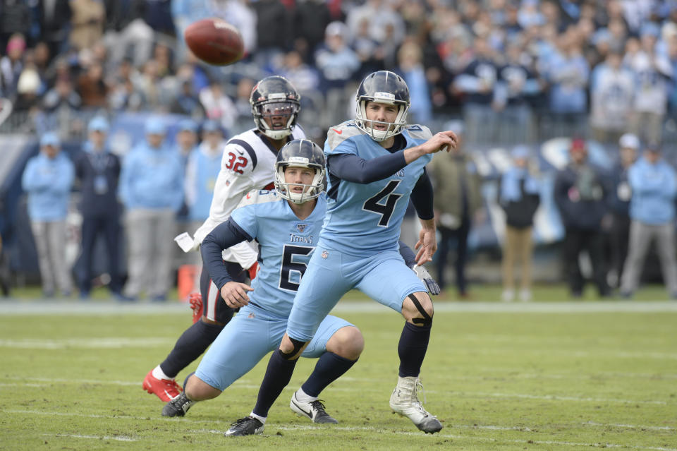 Tennessee Titans kicker Ryan Succop (4) and holder Brett Kern (6) chase after the ball after Succop's 45-yard field goal attempt was blocked by the Houston Texans in the first half of an NFL football game Sunday, Dec. 15, 2019, in Nashville, Tenn. (AP Photo/Mark Zaleski)