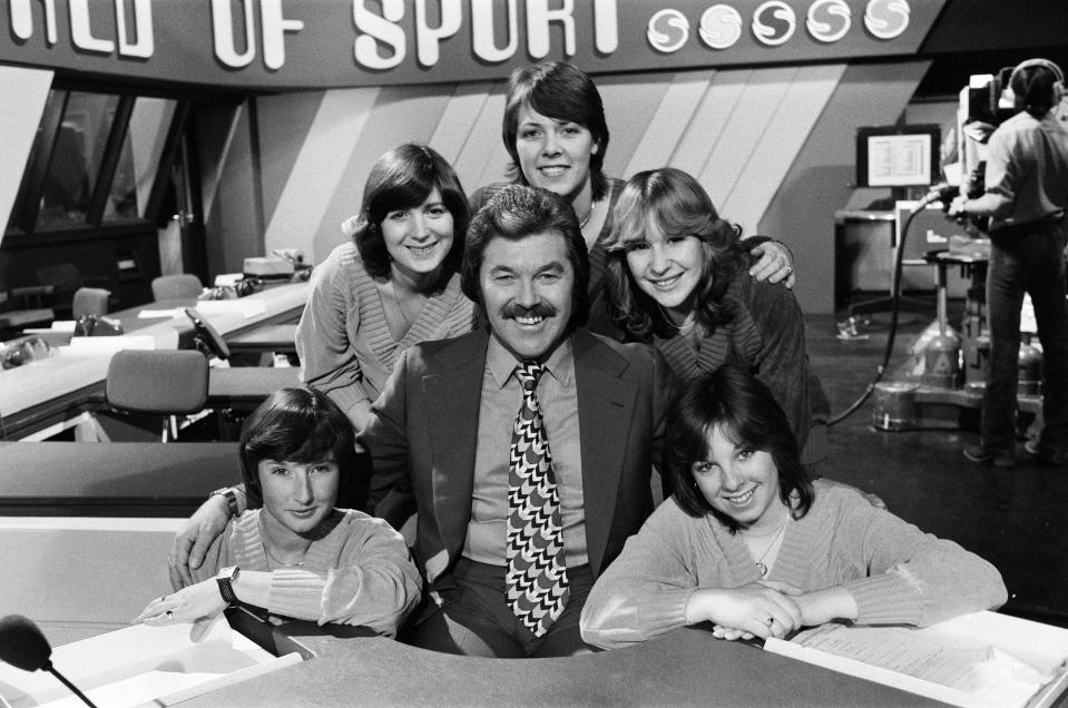 ITV's 'World of Sport' presenter Dickie Davies with five women who worked with him.(Getty)