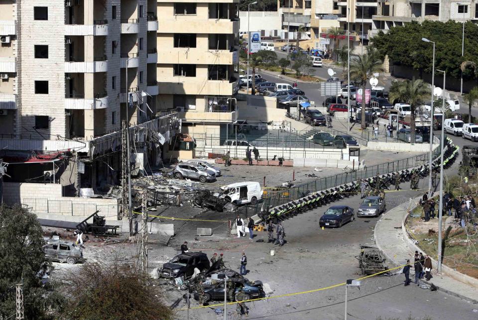 A view shows the Iranian cultural centre (L) at the site of an explosion in the southern suburbs of Beirut February 19, 2014. (REUTERS/Hasan Shaaban)