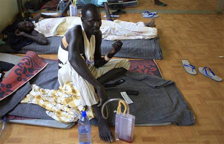 A displaced man with gun shot wounds rests at a United Nations hospital at Tomping camp, where some 15,000 displaced people who fled their homes are sheltered by the UN, near South Sudan's capital Juba January 7, 2014. REUTERS/James Akena