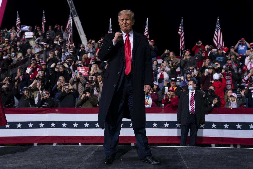 President Donald Trump walks off stage after a campaign rally for Senate Republican candidates, Sen. Kelly Loeffler, R-Ga., and Sen. David Perdue, R-Ga.,at Valdosta Regional Airport, Saturday, Dec. 5, 2020, in Valdosta, Ga. (AP Photo/Evan Vucci)