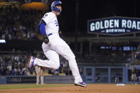 Los Angeles Dodgers' Corey Seager celebrates as he rounds first after hitting a two-run home run during the eighth inning of a baseball game against the San Diego Padres Wednesday, Sept. 29, 2021, in Los Angeles. (AP Photo/Mark J. Terrill)