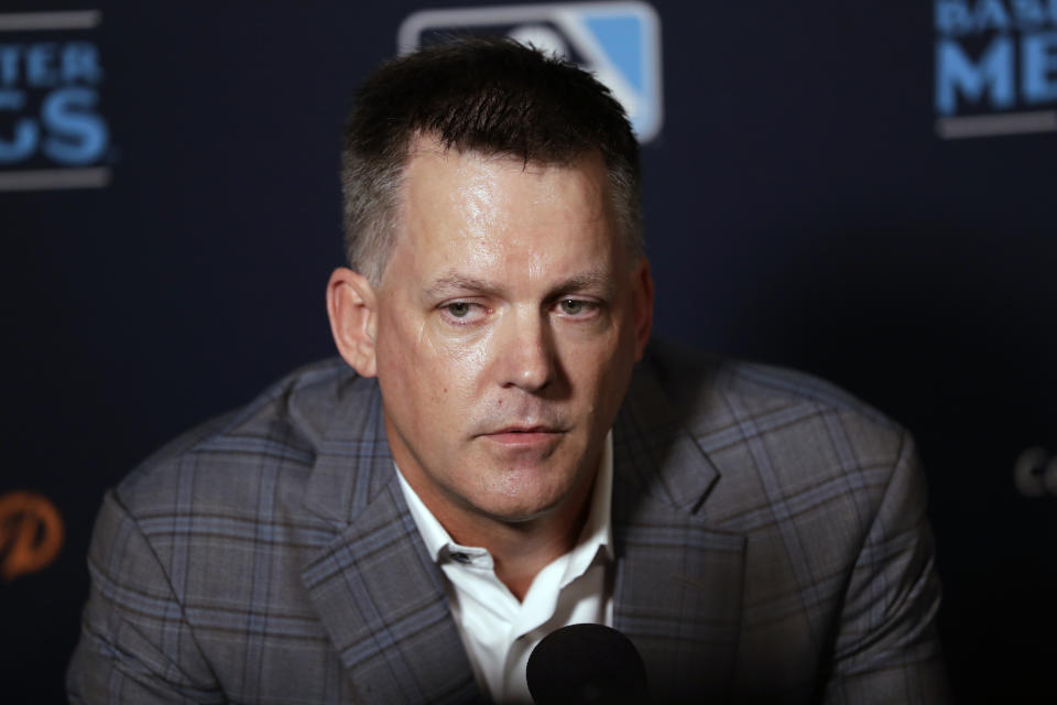 In this Dec. 10, 2019, file photo, Houston Astros manager A.J. Hinch speaks during the Major League Baseball winter meetings, in San Diego. Houston  manager AJ Hinch and general manager Jeff Luhnow were suspended for the entire season Monday, Jan. 13, 2020,  and the team was fined $5 million for sign-stealing by the team in 2017 and 2018 season. Commissioner Rob Manfred announced the discipline and strongly hinted that current Boston manager Alex Cora — the Astros bench coach in 2017 — will face punishment later. Manfred said Cora developed the sign-stealing system used by the Astros. (AP Photo/Gregory Bull, File)