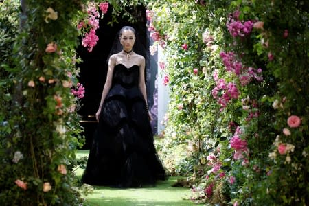 A model presents a creation by designer Maria Grazia Chiuri as part of her Haute Couture Fall/Winter 2019/20 collection show for fashion house Dior in Paris