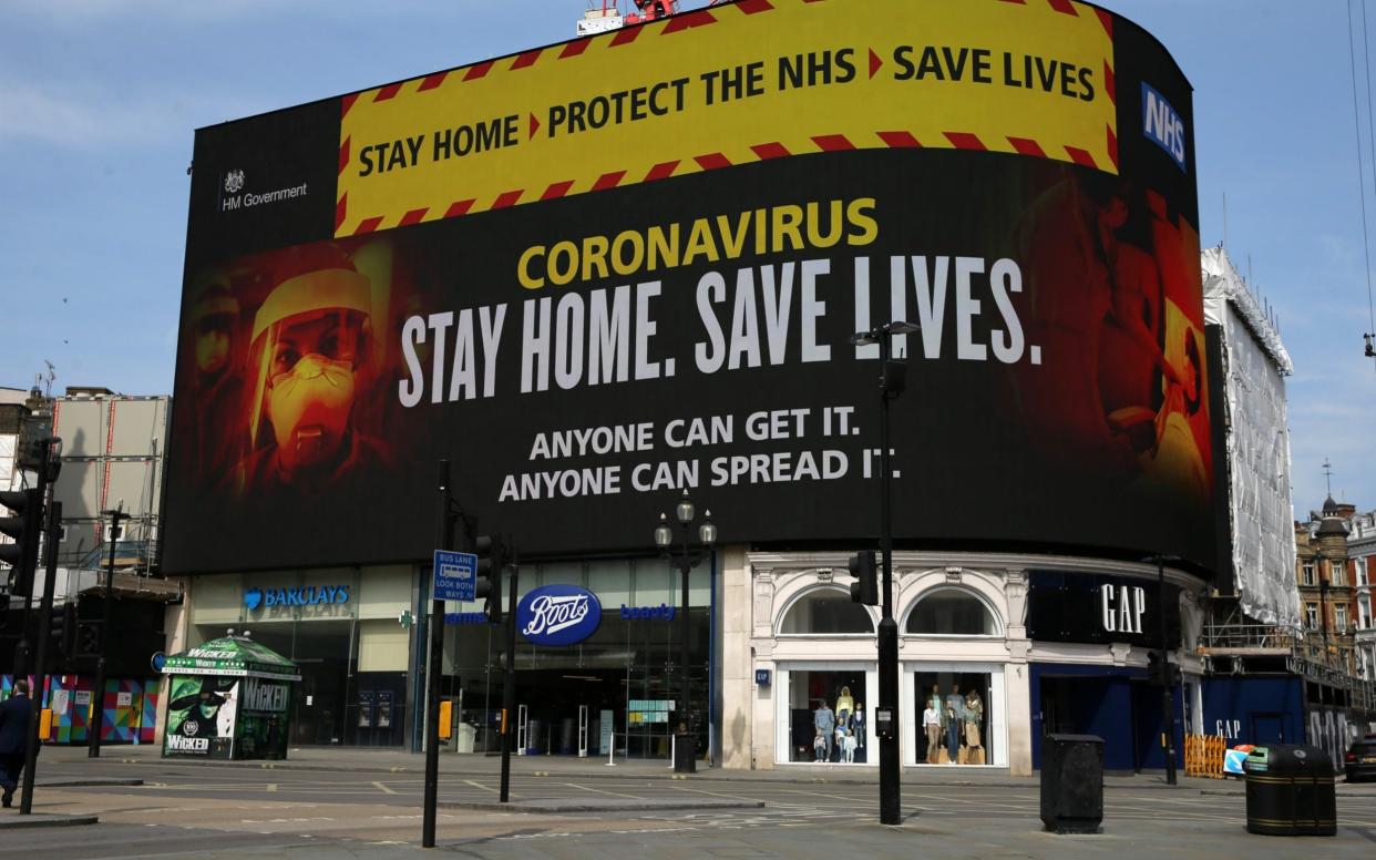 An advertising board in Piccadilly Circus in London in April -  Isabel Infantes/Getty Images