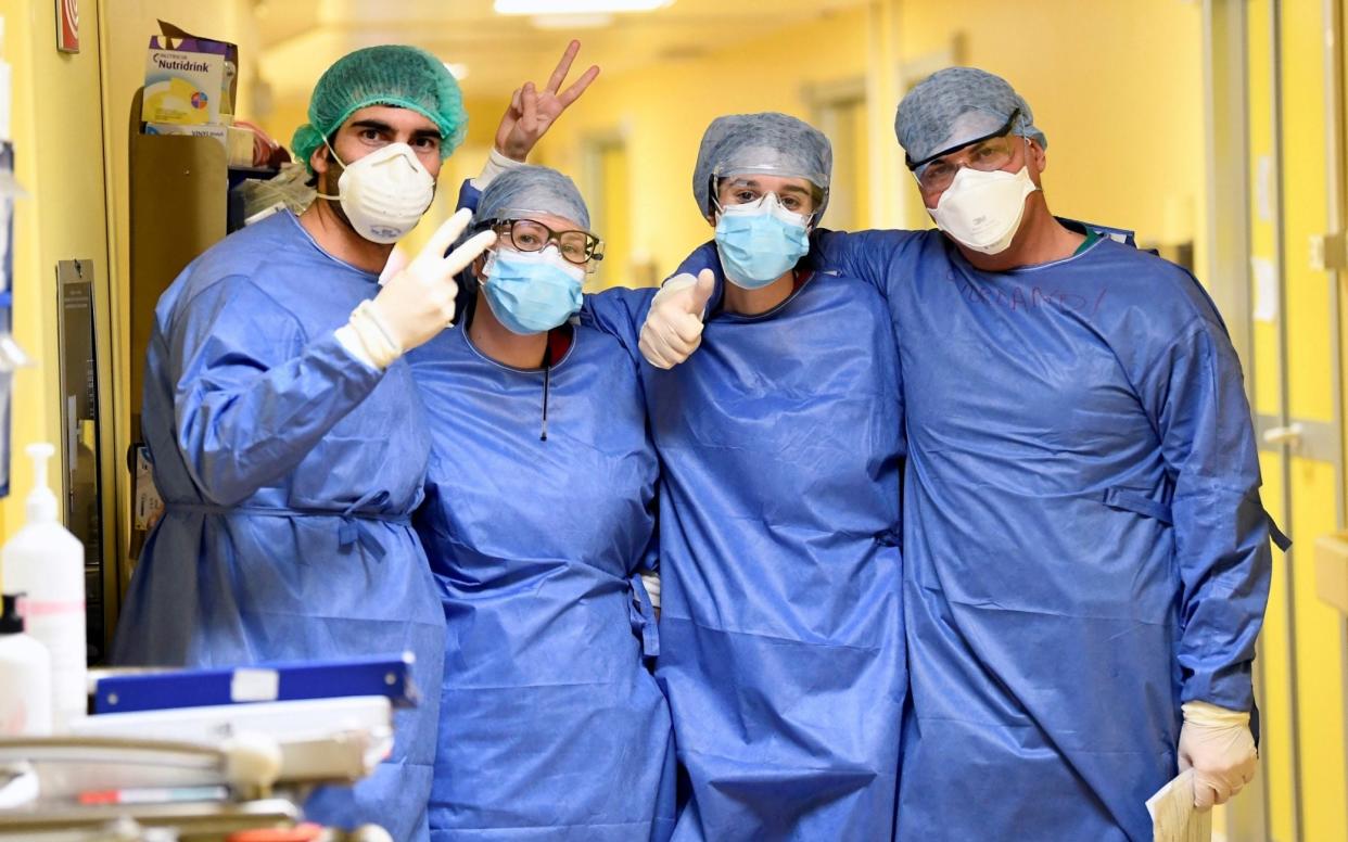 Medics at an intensive care unit in Milan, Italy - Flavio Lo Scalzo/Reuters