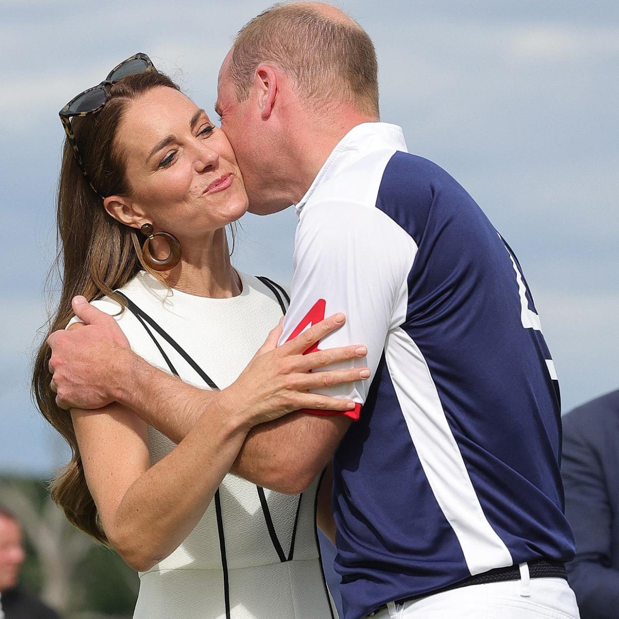  Prince William kisses Kate Middleton on the cheek 