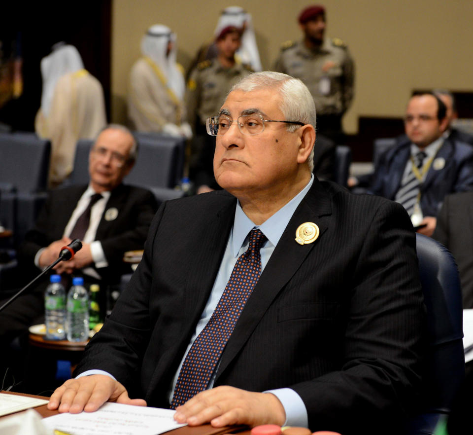 Egypt's interim President Adly Mansour attends the closing session of the Arab League Summit at Bayan Palace, Kuwait on Wednesday, March 26, 2014.(AP Photo/Nasser Waggi)