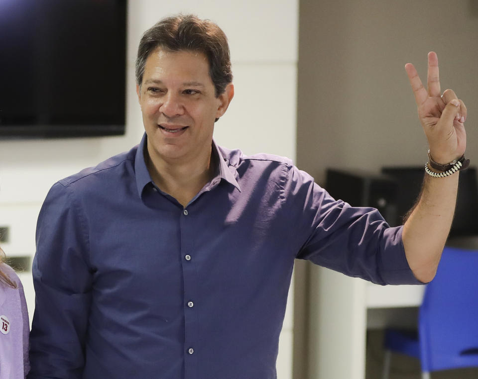 Fernando Haddad, Brazil's presidential candidate for the Workers' Party, gestures after voting during presidential election runoff, in Sao Paulo, Brazil, Sunday, Oct. 28, 2018. Brazilian voters decide Sunday who will next lead the world's fifth-largest country, the left-leaning Haddad or far-right rival Jair Bolsonaro. (AP Photo/Andre Penner)