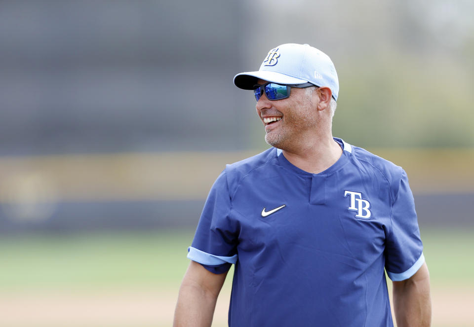 Tampa Bay Rays manager Kevin Cash takes the practice field during the start of baseball spring training in Port Charlotte, Fla., Thursday, Feb. 13, 2020. (Octavio Jones/Tampa Bay Times via AP)