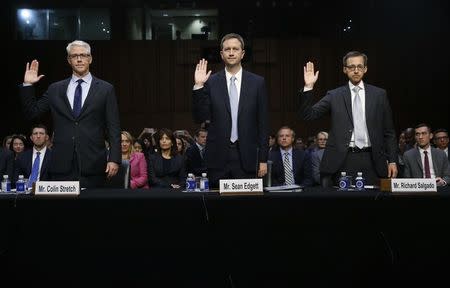 (L-R) Colin Stretch, general counsel for Facebook; Sean Edgett, acting general counsel for Twitter; and Richard Salgado, director of law enforcement and information security at Google, are sworn in prior to testifying before Senate Judiciary Crime and Terrorism Subcommittee hearing on on "ways to combat and reduce the amount of Russian propaganda and extremist content online," on Capitol Hill in Washington, U.S., October 31, 2017. REUTERS/Jonathan Ernst