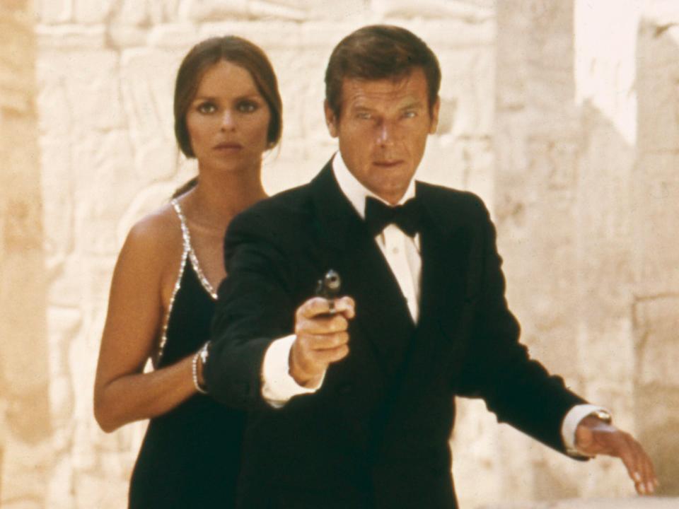 Actors Barbara Bach as Major Anya Amasova/Agent XXX and Roger Moore as James Bond at the temple of Karnak in Egypt, in the film 'The Spy Who Loved Me', 1977