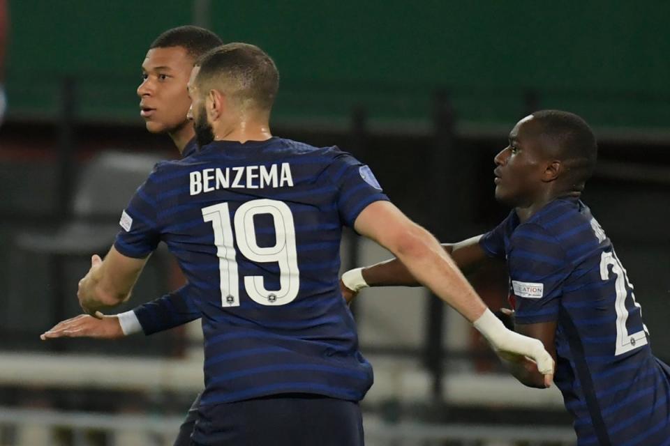 Kylian Mbappe, left, rescued a point for France (Michael Gruber/AP) (AP)