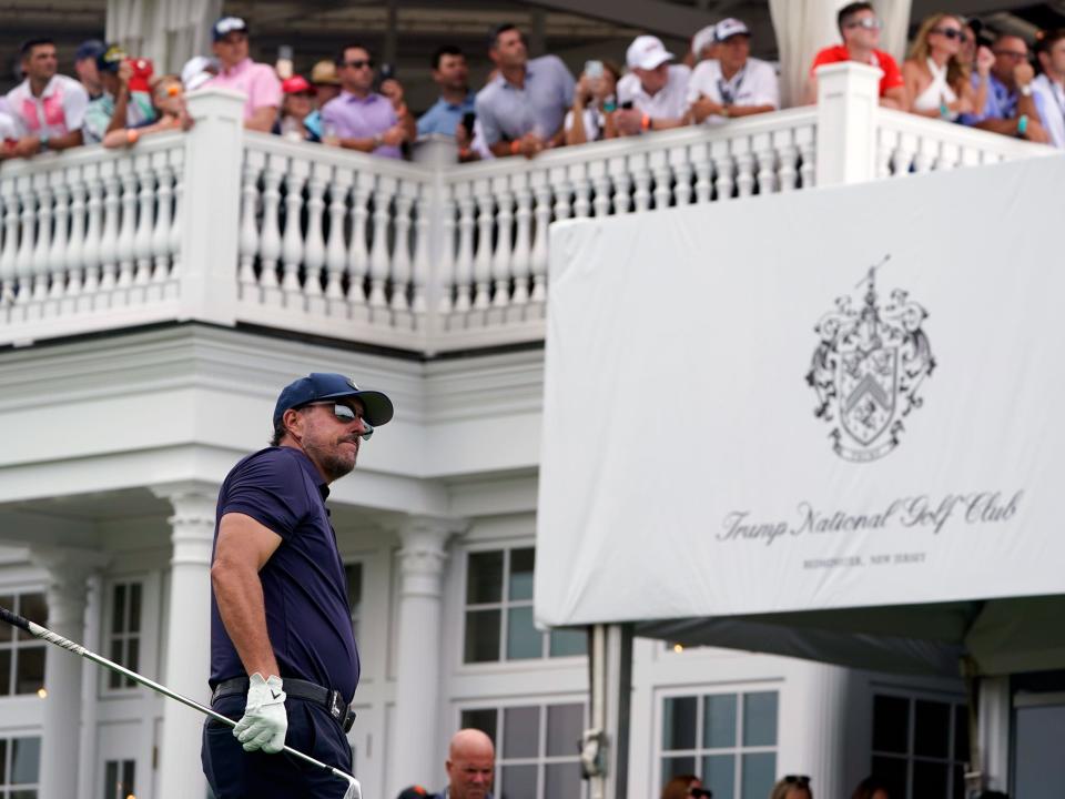 Phil Mickelson tees off the 16th hole during the first round of the Bedminster Invitational LIV Golf tournament in Bedminster, NJ.