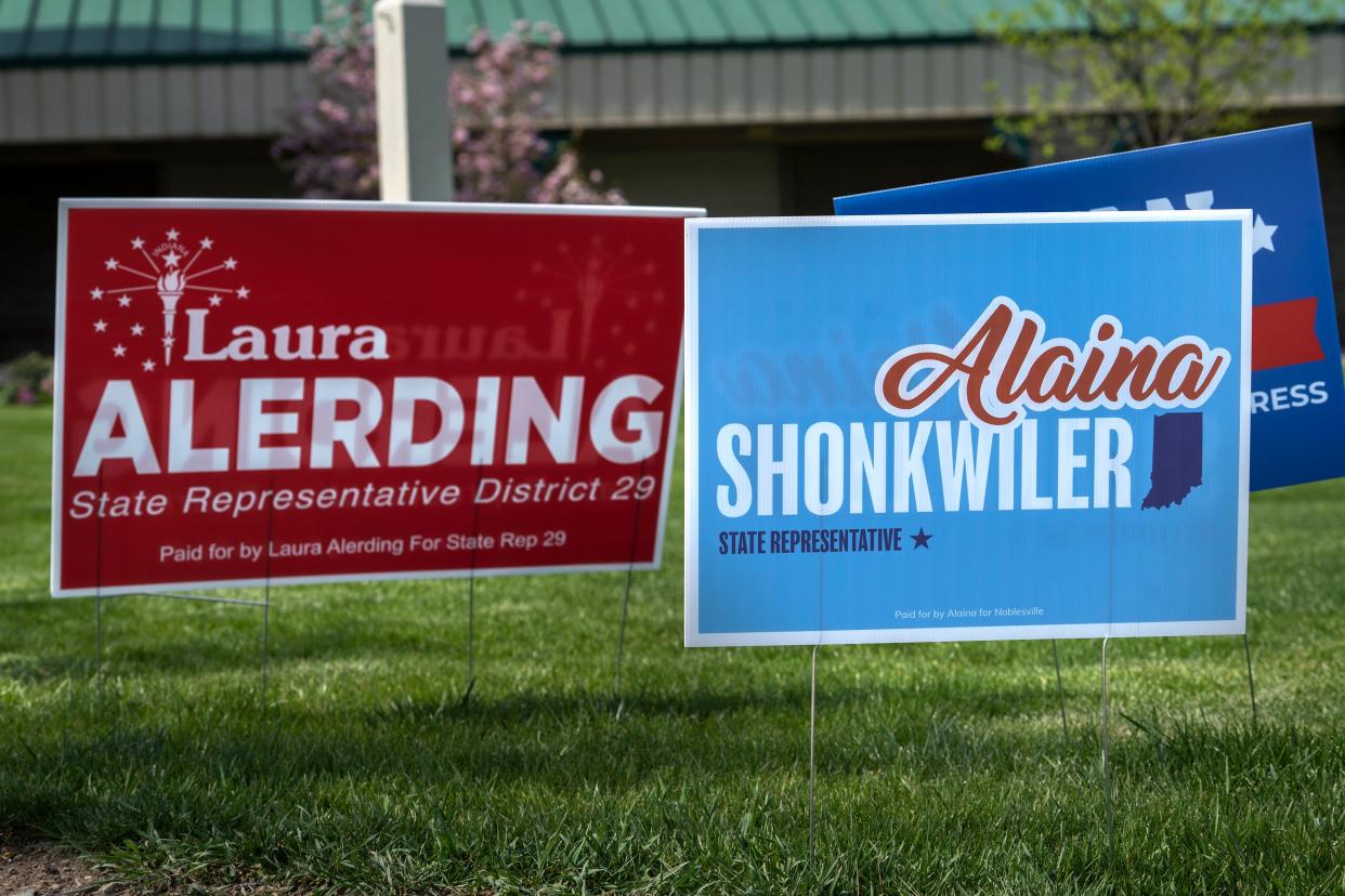 Candidate signs, including those for State Representative candidates Laura Alerding and Alaina Shonkwiler, line the walkway up to the Hamilton County Fairgrounds polling site for voters to see before early voting Tuesday, April 16, 2024 in Noblesville. The primary election is on May 7, 2024.