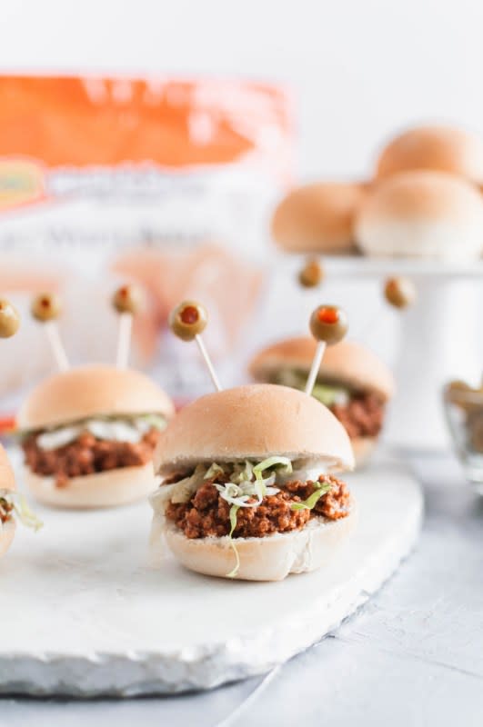 <p>Meg's Everyday Indulgence</p><p>A marriage of saucy taco meat, shredded cheese and lettuce piled on top of warm rolls, these sliders are just what you need for Halloween night before trick-or-treating.</p><p><strong>Get the recipe: <a href="http://megseverydayindulgence.com/2019/10/11/halloween-sliders/" rel="nofollow noopener" target="_blank" data-ylk="slk:Halloween Sliders;elm:context_link;itc:0;sec:content-canvas" class="link ">Halloween Sliders</a></strong></p><p><strong>Related: <a href="https://www.yahoo.com/lifestyle/22-healthy-halloween-snack-ideas-145932305.html" data-ylk="slk:22 of the BEST Healthy Halloween Snack Ideas for Kids From Frankamole to Apple Mummies;elm:context_link;itc:0;sec:content-canvas;outcm:mb_qualified_link;_E:mb_qualified_link;ct:story;" class="link  yahoo-link">22 of the BEST Healthy Halloween Snack Ideas for Kids From Frankamole to Apple Mummies</a></strong></p>