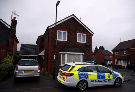 FILE PHOTO: A police car is parked outside a house, after a drone was flown near Gatwick Airport, forcing the airport to close, in Crawley, Britain December 23, 2018. REUTERS/Hannah McKay/File Photo