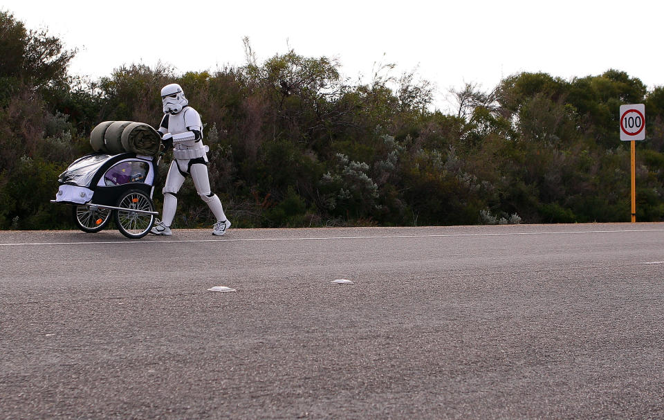 PERTH, AUSTRALIA - JULY 15: Stormtrooper Paul French is pictured on day 5 of his over 4,000 kilometre journey from Perth to Sydney walking along Old Mandurah road approximately 20 kilometres from Mandurah on July 15, 2011 in Perth, Australia. French aims to walk 35-40 kilometres a day, 5 days a week, in full Stormtrooper costume until he reaches Sydney. French is walking to raise money for the Starlight Foundation - an organisation that aims to brighten the lives of ill and hostpitalised children in Australia. (Photo by Paul Kane/Getty Images)