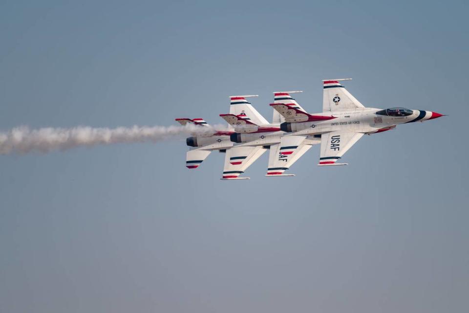 Three F-16 Fighting Falcon jets with the U.S. Air Force Air Demonstration Squadron “Thunderbirds” perform an echelon pass at the California Capital Airshow on Friday, Sept. 24, 2021, at Mather Airport in Sacramento.