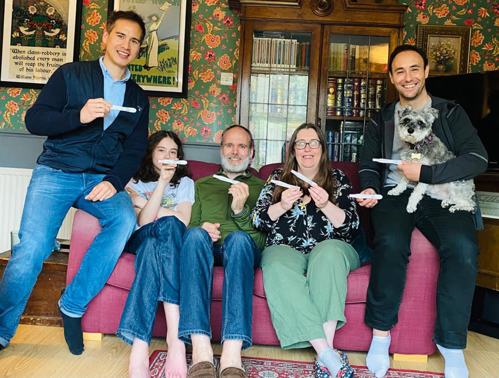 Surrogate Dawn Allen and her family, celebrate her positive pregnancy test with Aled Haydn Jones and Emile Doxey. (Collect/PA Real Life)