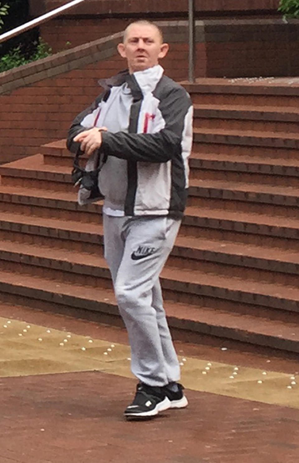 Kevin Flanagan outside Birmingham Crown Court where he denied murdering Lisa Bennett six years ago (Picture: PA)