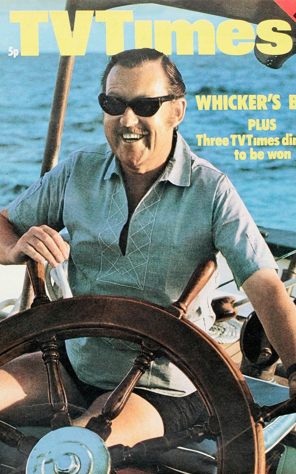 TV Times cover featuring television presenter Alan Whicker piloting a boat, circa July 1971 - getty