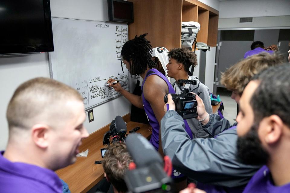 Pickerington Central's R.J. Keuchler (33) writes the Tigers into the finals bracket for the Division I boys basketball state tournament.