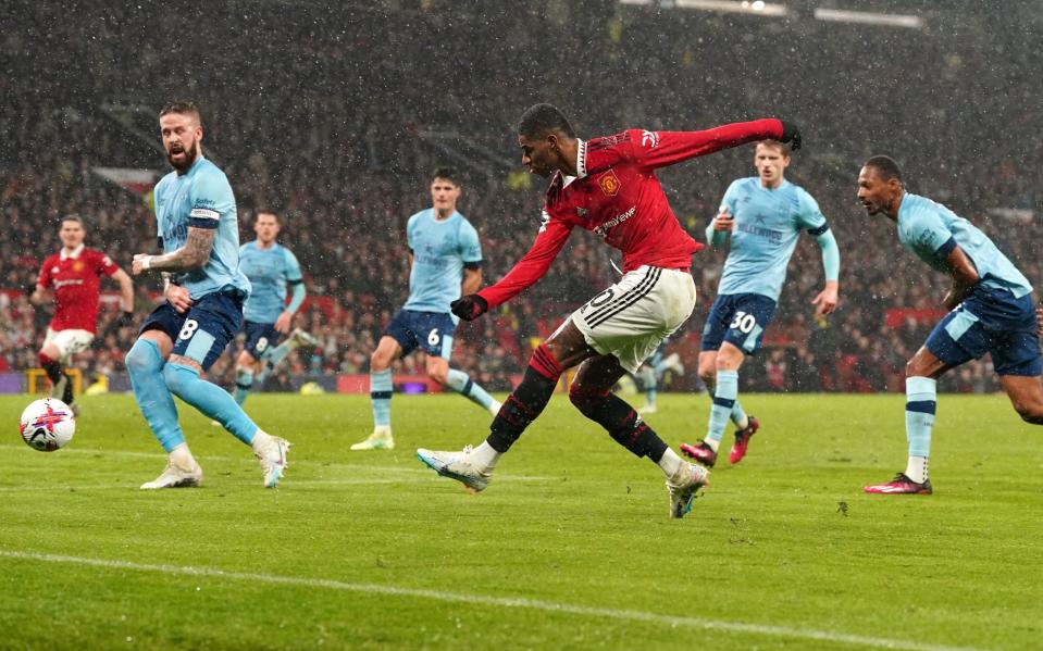 Manchester United's Marcus Rashford shoots towards goal during the Premier League match at Old Trafford, Manchester. - Nick Potts/PA