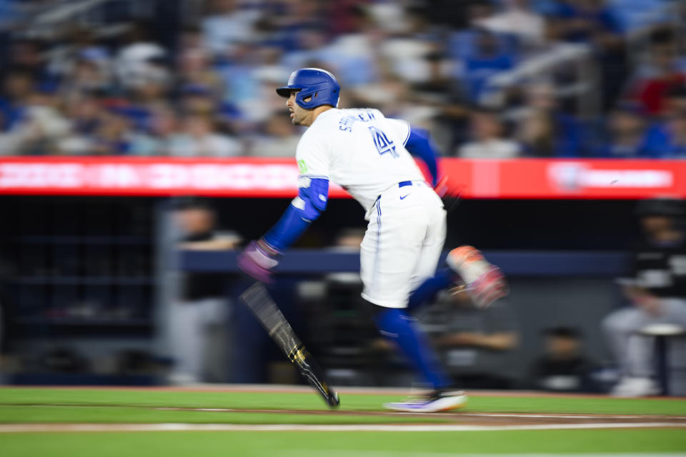 Toronto Blue Jays' George Springer (4) lines out during the seventh inning of a baseball game against the Chicago White Sox in Toronto on Tuesday, May 21, 2024. (Christopher Katsarov/The Canadian Press via AP)