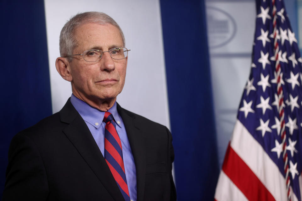 FILE PHOTO: Dr. Anthony Fauci listens to daily coronavirus briefing at the White House in Washington