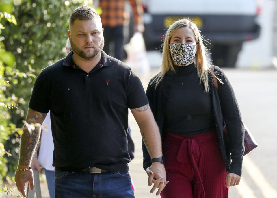 Teacher Kandice Barber, 35, arrives with her husband Daniel at Aylesbury Crown Court, Buckinghamshire, where she is appearing accused of engaging in illegal sexual activity with a 15-year-old boy.