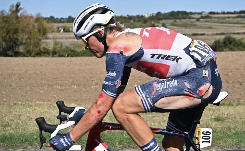 Team Trek rider Toms Skujins rides after crashing during the 10th stage between Le Chateau d’Oleron and Saint Martin de Re.