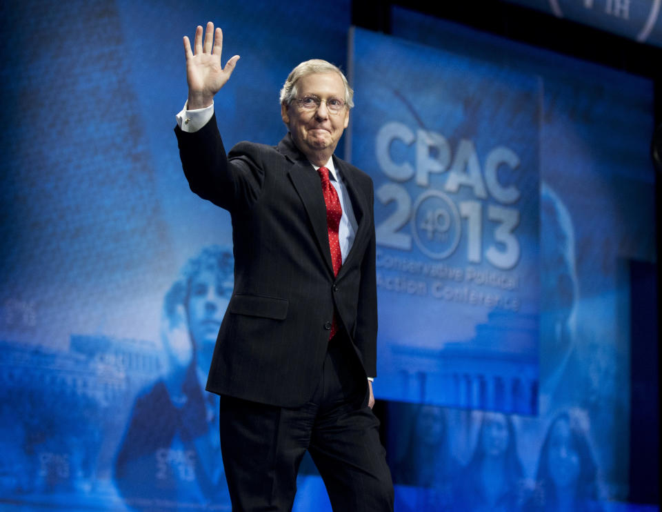McConnell waves as he arrives to speak at the 40th annual Conservative Political Action Conference in National Harbor, Md. (AP Photo/Manuel Balce Ceneta, File)