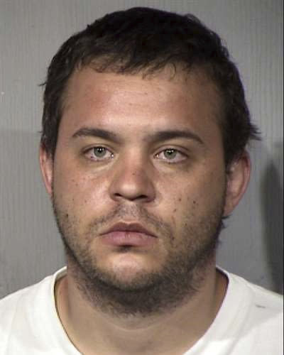 FILE - A booking photo provided by the Maricopa County Sheriff's Office in Phoenix shows Matthew Egler. Authorities on Wednesday, July 29, 2020, announced the arrest of Egler, 29, on one count of arson for a fire that destroyed much of the Arizona and Maricopa County Democratic Party headquarters. (Maricopa County Sheriff's Office via AP)