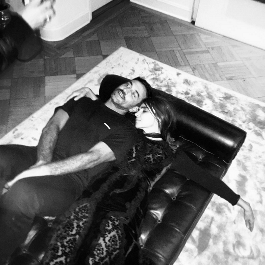 Carine Roitfeld and Givenchy artistic director Ricardo Tisci having a much needed quick rest. [Photo: Instagram/Carine Roitfeld]