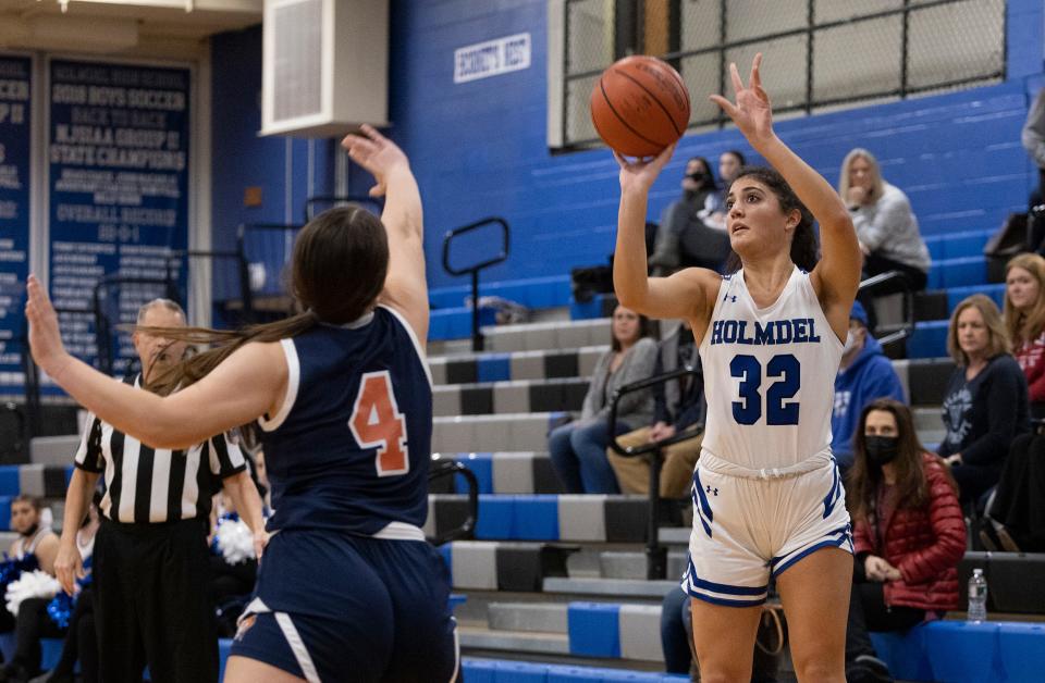 Holmdel Alexandra Loucopoulos goes up with a first half shot. Holmdel Girls Basketball defeats Trinity Hall in Holmdel, NJ on January 25, 2022. 