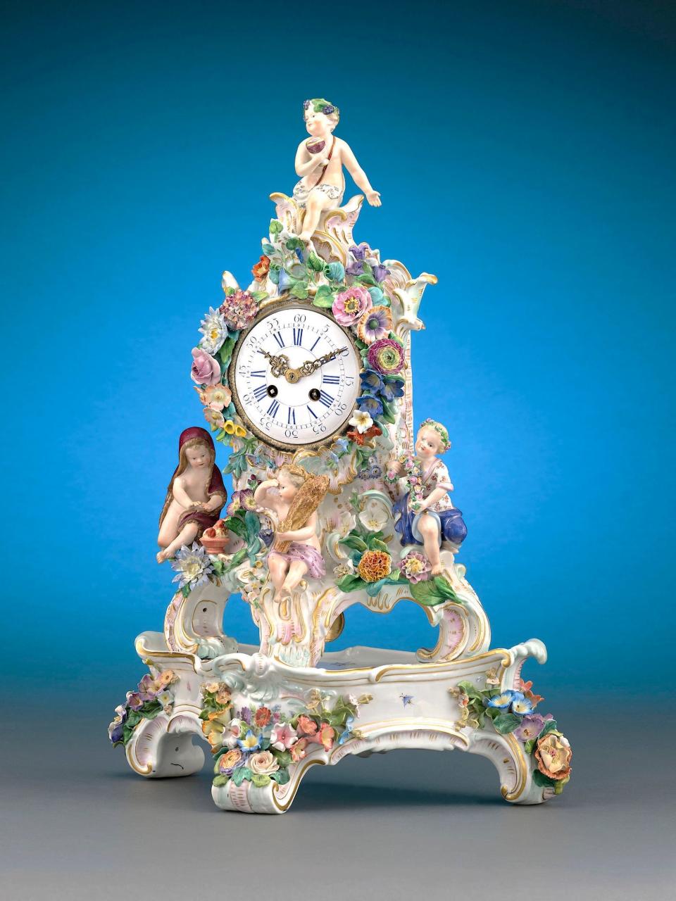 This horological bonbon, crafted in the relentlessly cheerful Rococo style with posies of bright flowers, goes to town with its allegorical themes. It is crowned by Summer, which is coiffed with grapes and vine leaves, brandishing a brimming goblet of wine. Such precious detail could not be cherished for long; it fell from favor until embraced as irresistible camp a century later.