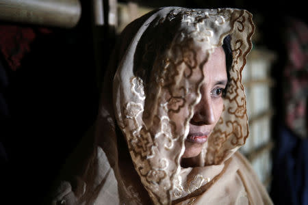 Taiyeba Begum (35), a Rohingya refugee woman who takes shelter in her relatives' house with other family members to avoid forced repatriation, looks on at a camp in Cox's Bazar, Bangladesh, November 14, 2018. REUTERS/Mohammad Ponir Hossain