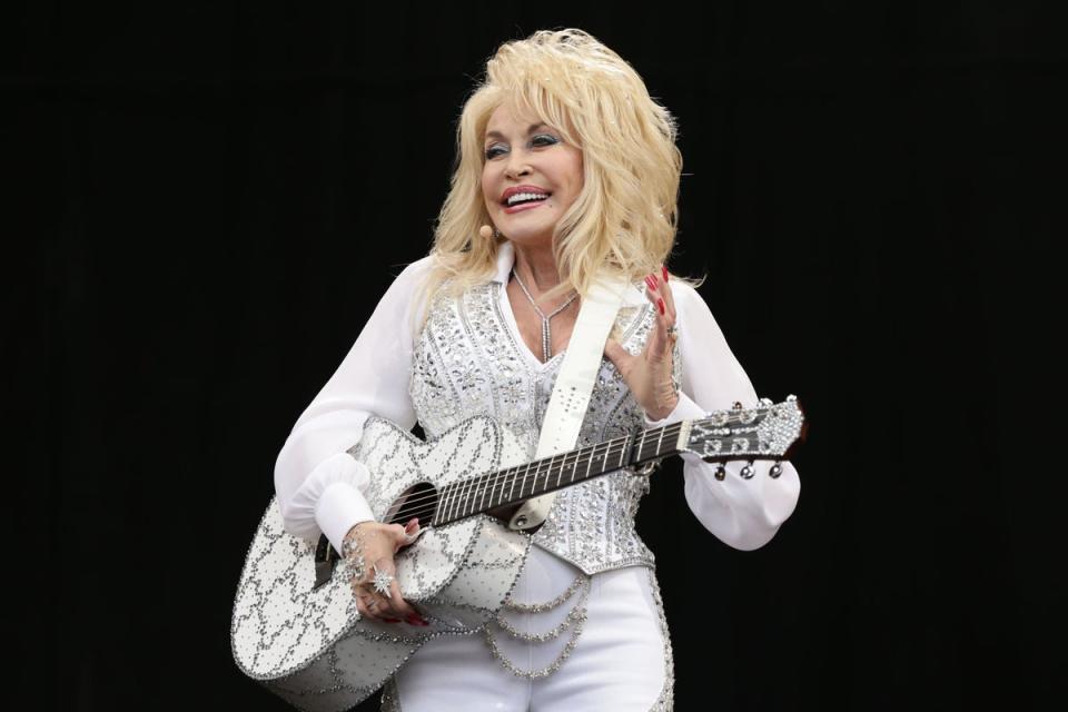 Dolly Parton  is teaming up with big name rockers for her new album (PA Archive)