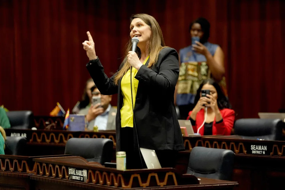 Arizona State Rep. Stephanie Stahl Hamliton, D, speaks on floor at the Capitol, Wednesday, April 10, 2024, in Phoenix. The Arizona Supreme Court ruled Tuesday that the state can enforce its long-dormant law criminalizing all abortions except when a mother's life is at stake. (AP Photo/Matt York)