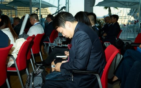 Delegates make notes at the conservation conference