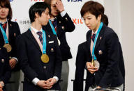 Pyeongchang 2018 Winter Olympics Men's figure skating gold medallist Yuzuru Hanyu (L) and Women's speed skating gold medallist Nao Kodaira attend a news conference upon their return from the Pyeongchang Winter Games, in Tokyo, Japan, February 26, 2018. REUTERS/Toru Hanai