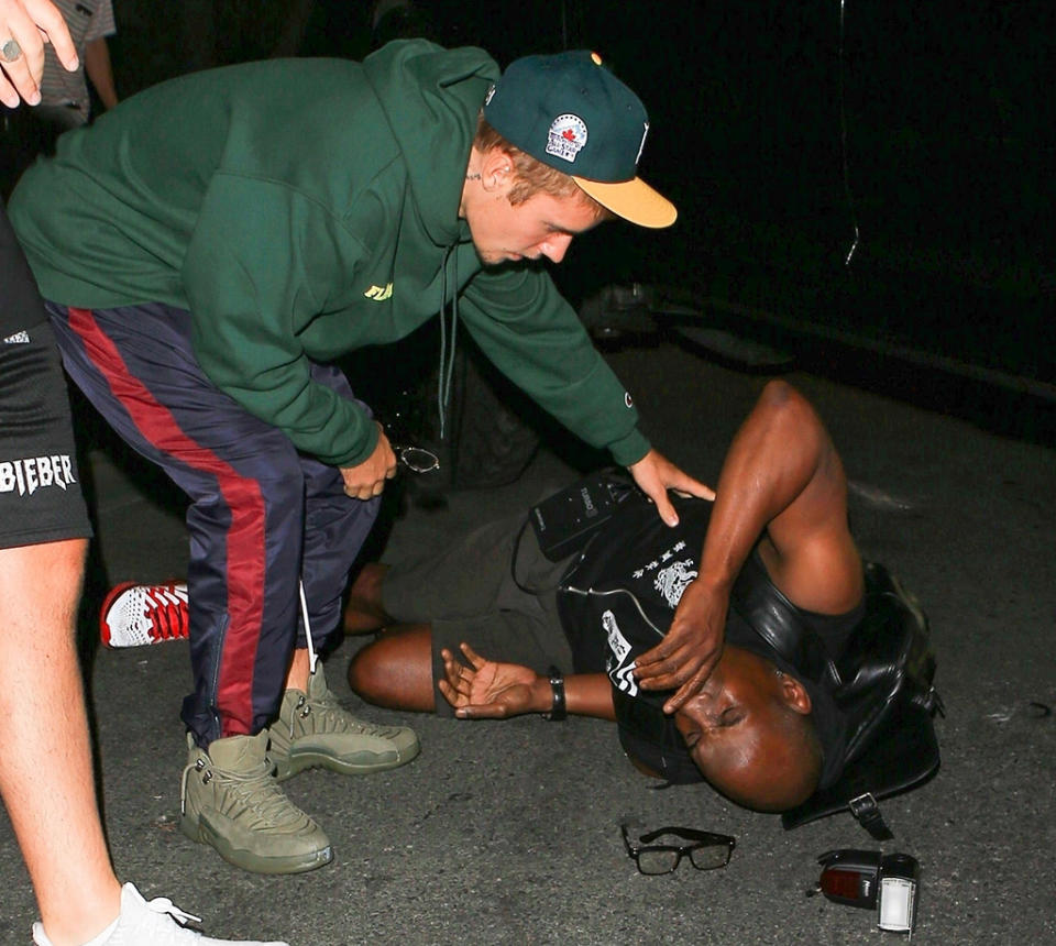 Los Angeles, CA - Justin Bieber didn't look much in the mood for photos after supposedly leaving church in LA. The singer who recently canceled the rest of his 'Purpose' tour tries to dash into his large truck but as he tries to speed away he seems to hits one of the paparazzi! Bieber quickly jumped out of his ride to check on the man who laid on the ground with his equipment in possible pain. This comes after reports that Justin has had a spiritual awakening. (Photo: GAMR/BACKGRID)