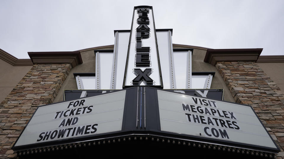 \The Megaplex Luxury Theatres are shown Monday, Aug. 31, 2020, in Holladay, Utah. Voting will look a little different this November. States are considering drive-thrus, outdoor polling places and curbside voting as they examine creative ways to safely offer same-day polling places during a pandemic. (AP Photo/Rick Bowmer)